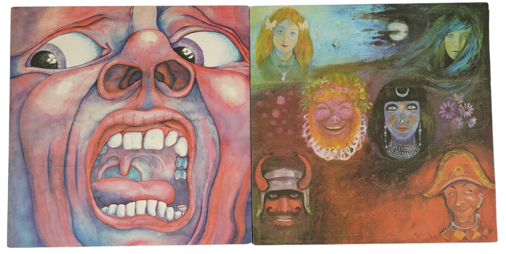 Two King Crimson LP record albums; In The Court of the Crimson King, Island ILPS 9111 palm tree label, and In The Wake of Poseidon, Island ILPS 9127 ‘i’ logo on label and textured sleeve. Condition - good